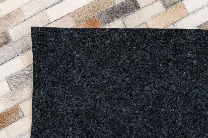 4' 8 x 6' 6 Cowhide Stocks Rug