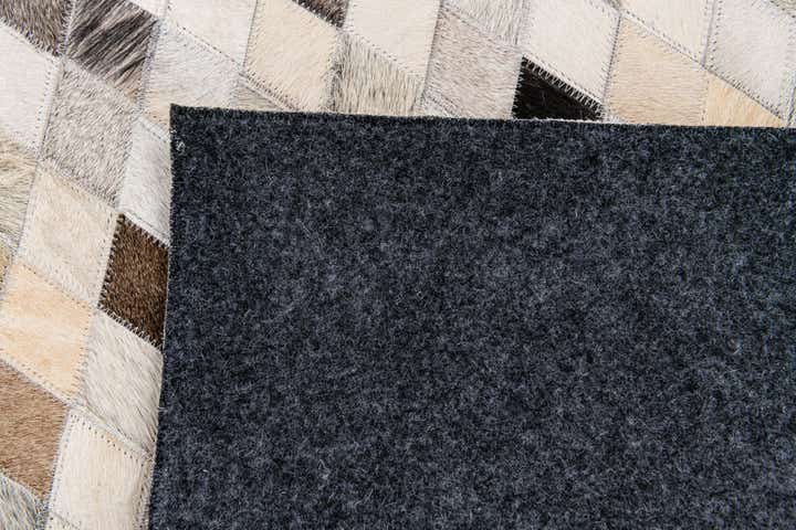 4' 7 x 6' 8 Cowhide Stocks Rug