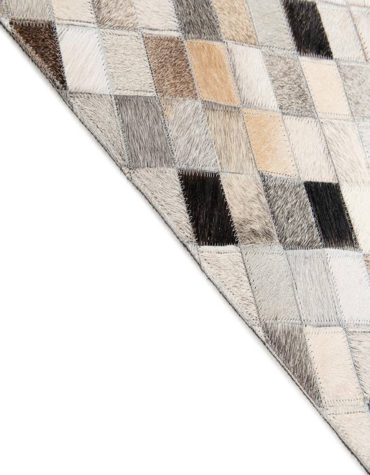 Detail image of 4' 7 x 6' 6 Cowhide Stocks Rug