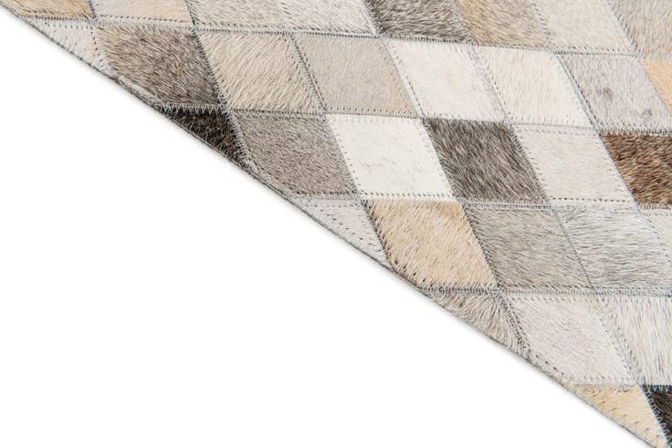 Detail image of 4' 7 x 6' 6 Cowhide Stocks Rug