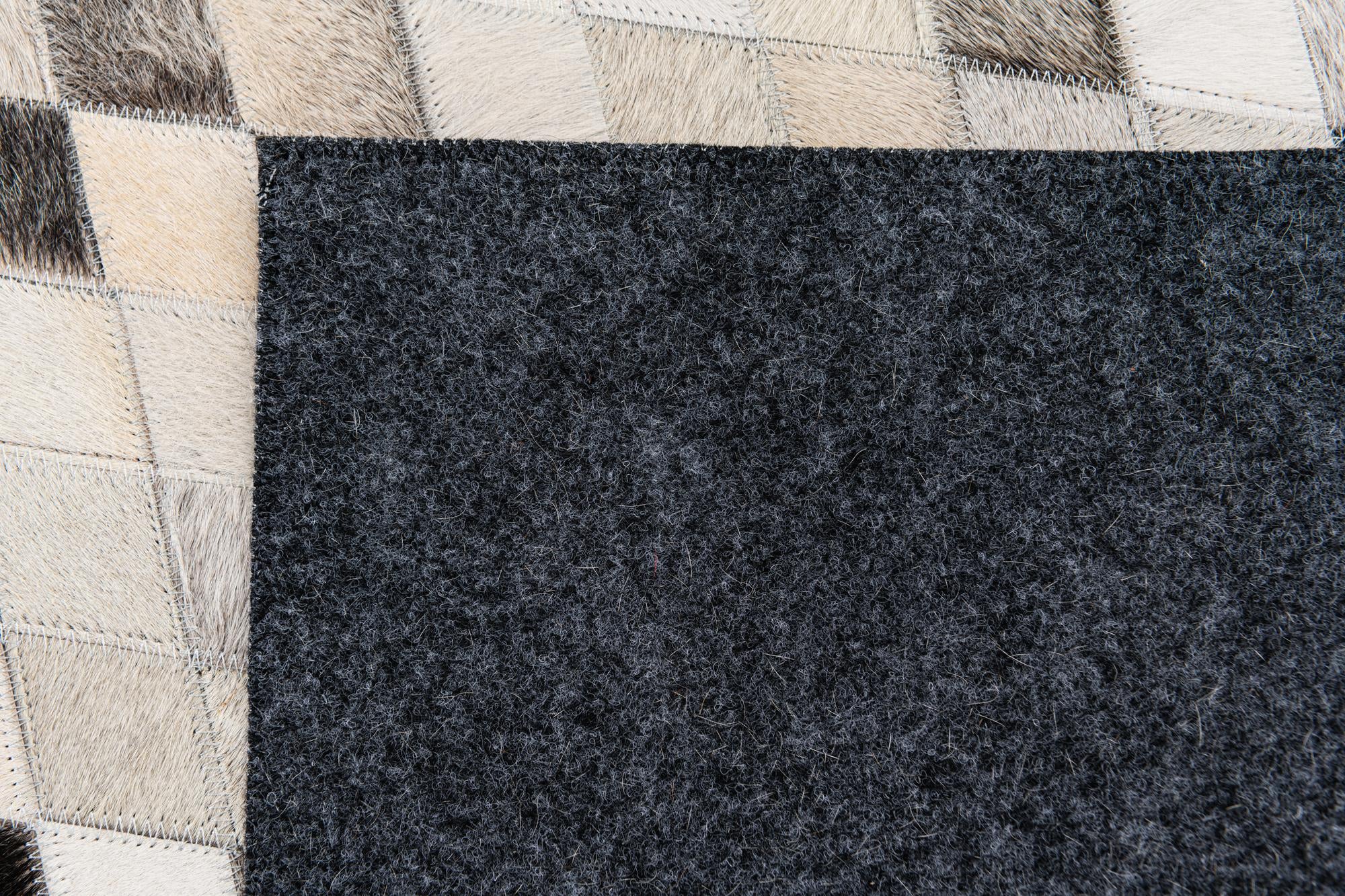 4' 7 x 6' 6 Cowhide Stocks Rug