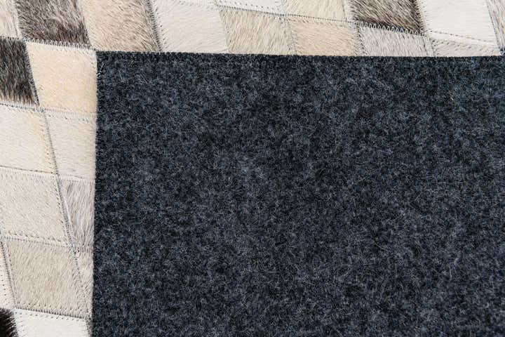 4' 7 x 6' 6 Cowhide Stocks Rug