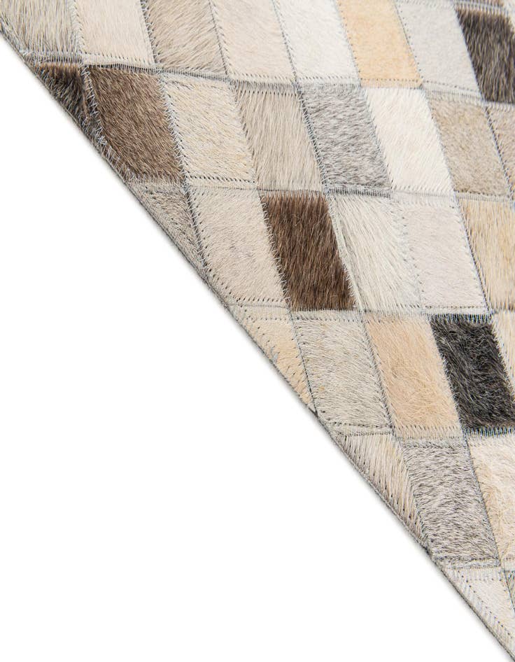 Detail image of 4' 7 x 6' 6 Cowhide Stocks Rug