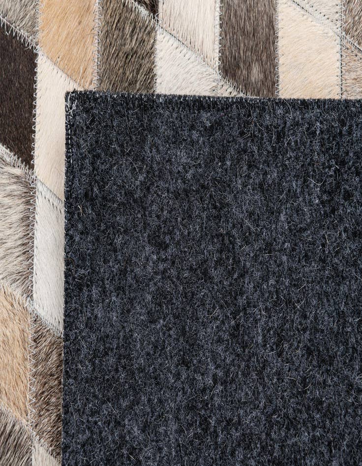 Detail image of 4' 7 x 6' 7 Cowhide Stocks Rug