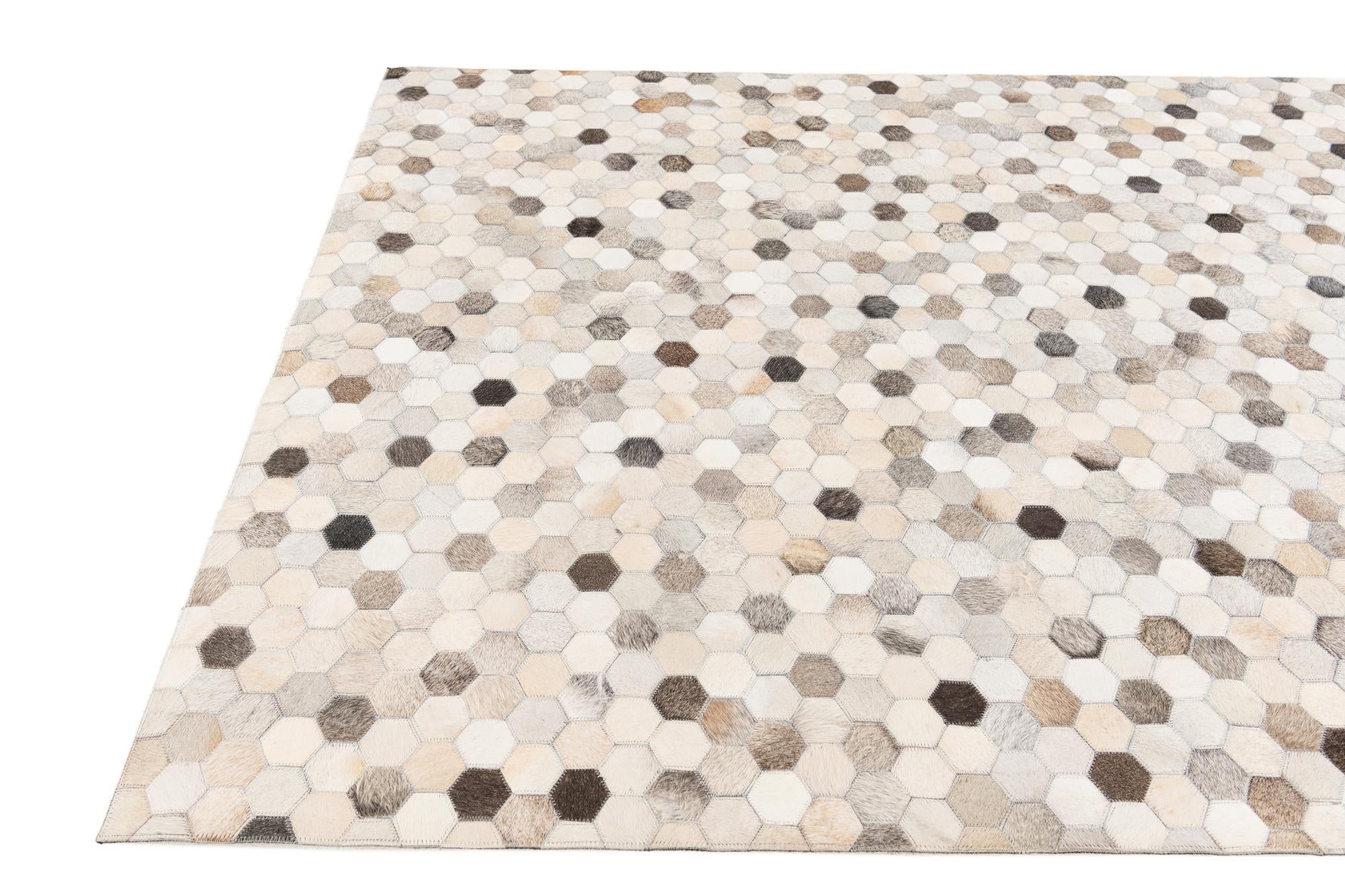 4' 8 x 6' 7 Cowhide Stocks Rug
