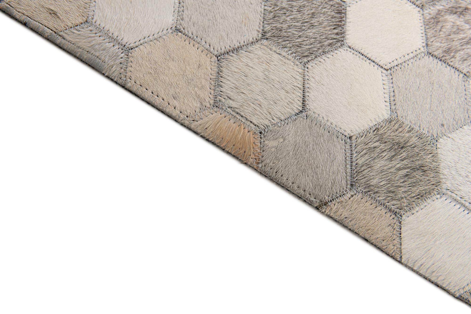 4' 8 x 6' 7 Cowhide Stocks Rug