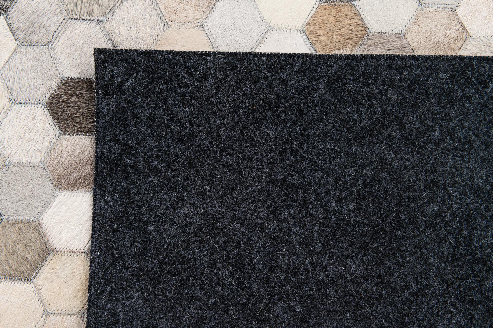 4' 8 x 6' 7 Cowhide Stocks Rug