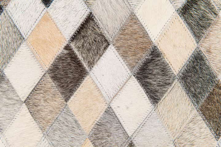 4' 8 x 6' 7 Cowhide Stocks Rug
