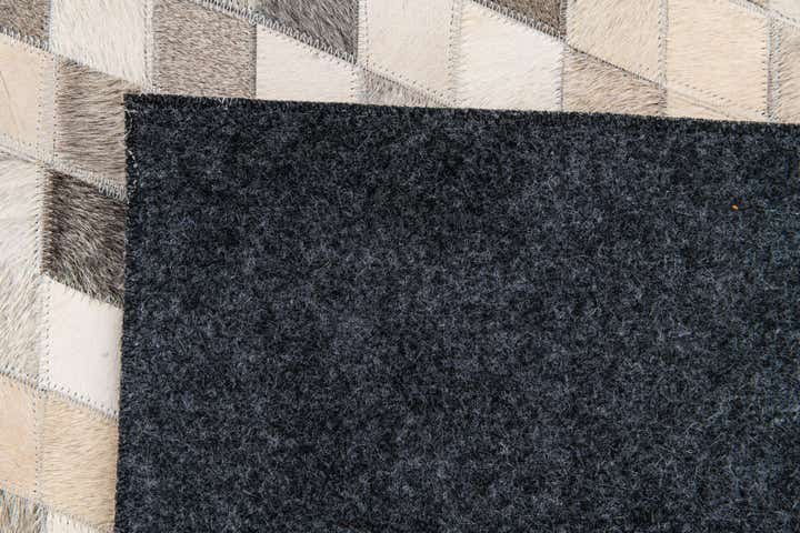 4' 9 x 6' 8 Cowhide Stocks Rug