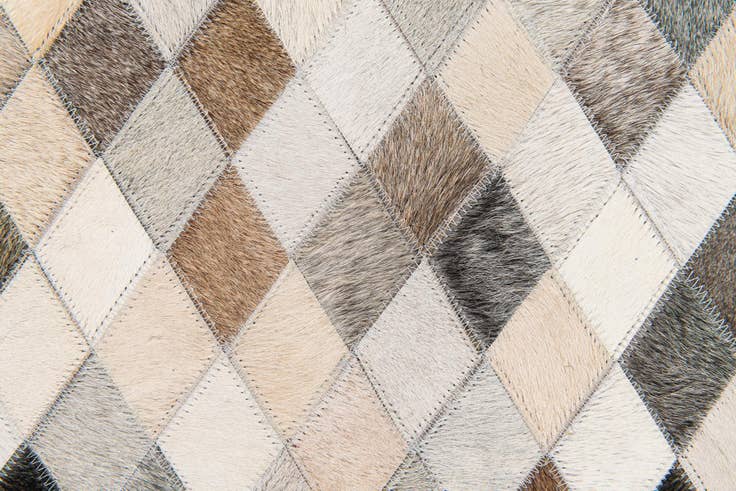 Detail image of 4' 7 x 6' 7 Cowhide Stocks Rug