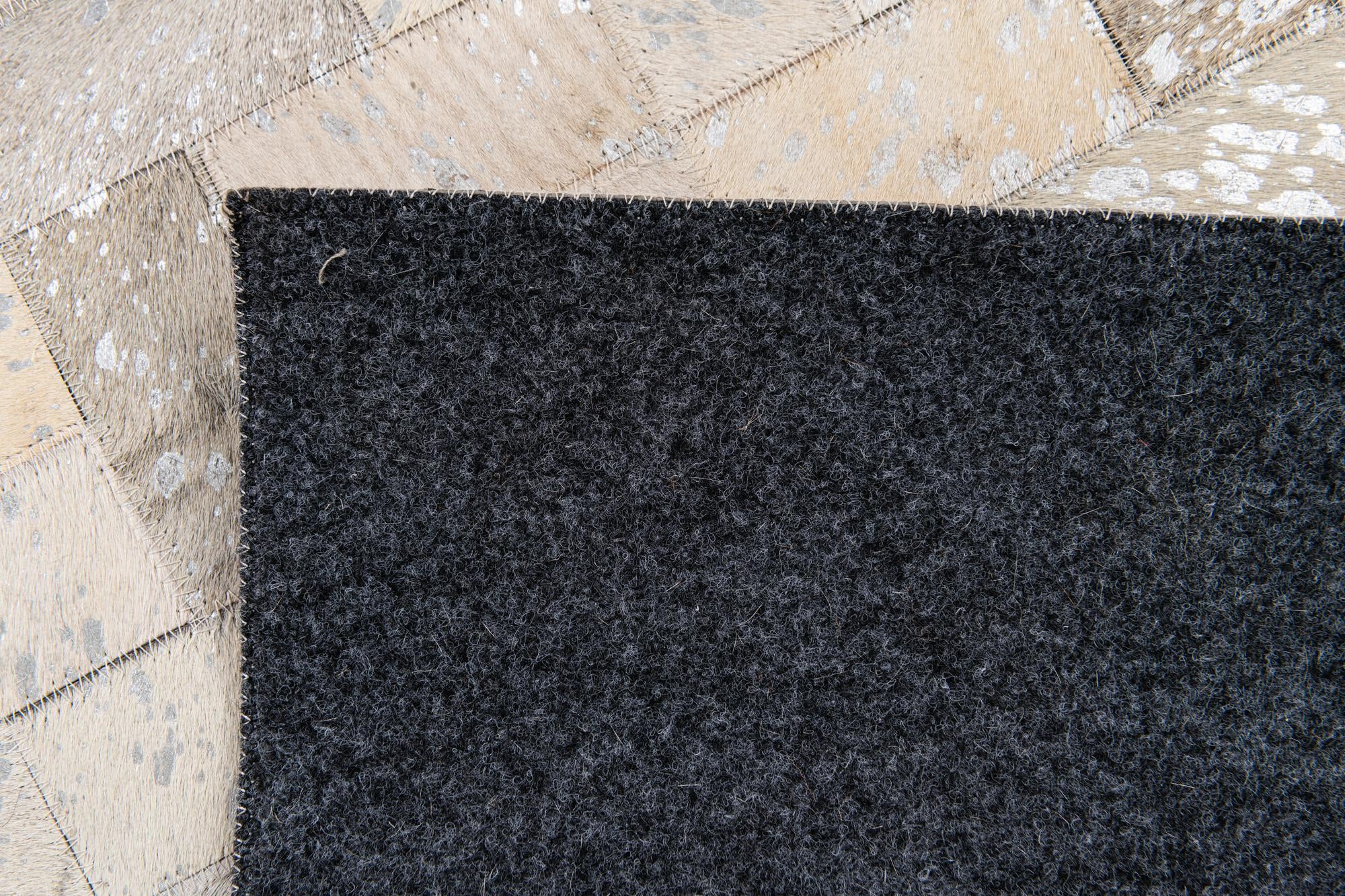 4' 8 x 6' 6 Cowhide Stocks Rug