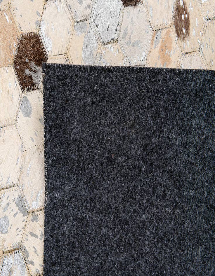 Detail image of 4' 7 x 6' 7 Cowhide Stocks Rug