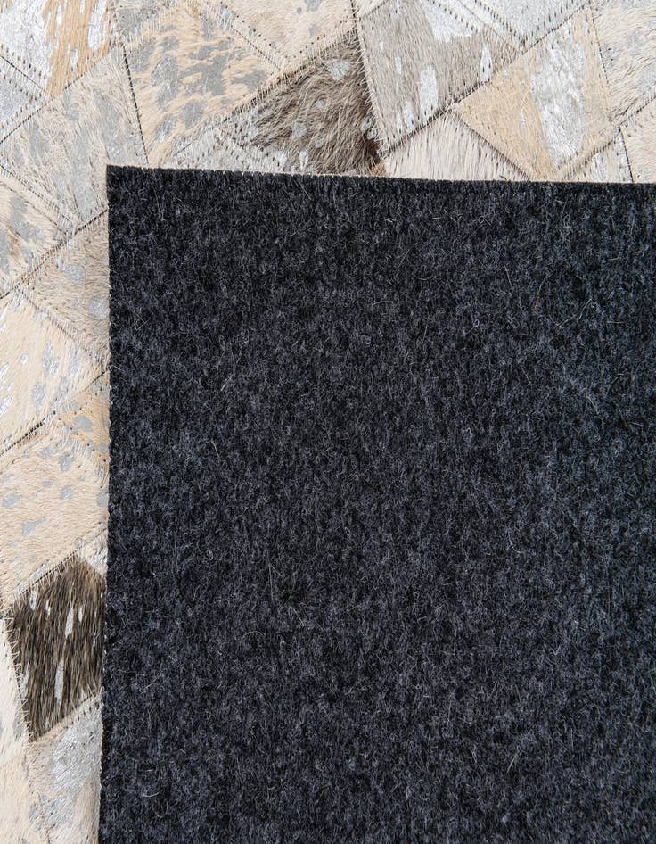 Detail image of 4' 6 x 6' 8 Cowhide Stocks Rug