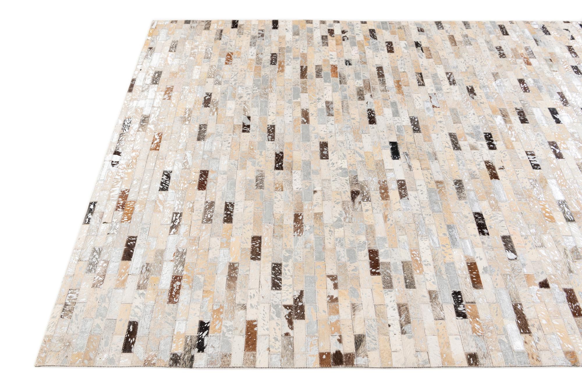 4' 8 x 6' 7 Cowhide Stocks Rug