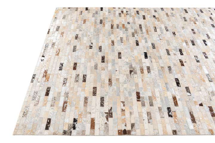 4' 8 x 6' 7 Cowhide Stocks Rug
