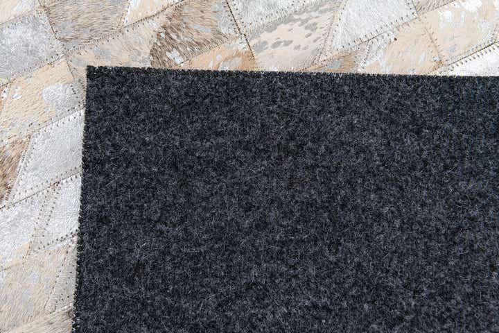 4' 6 x 6' 6 Cowhide Stocks Rug
