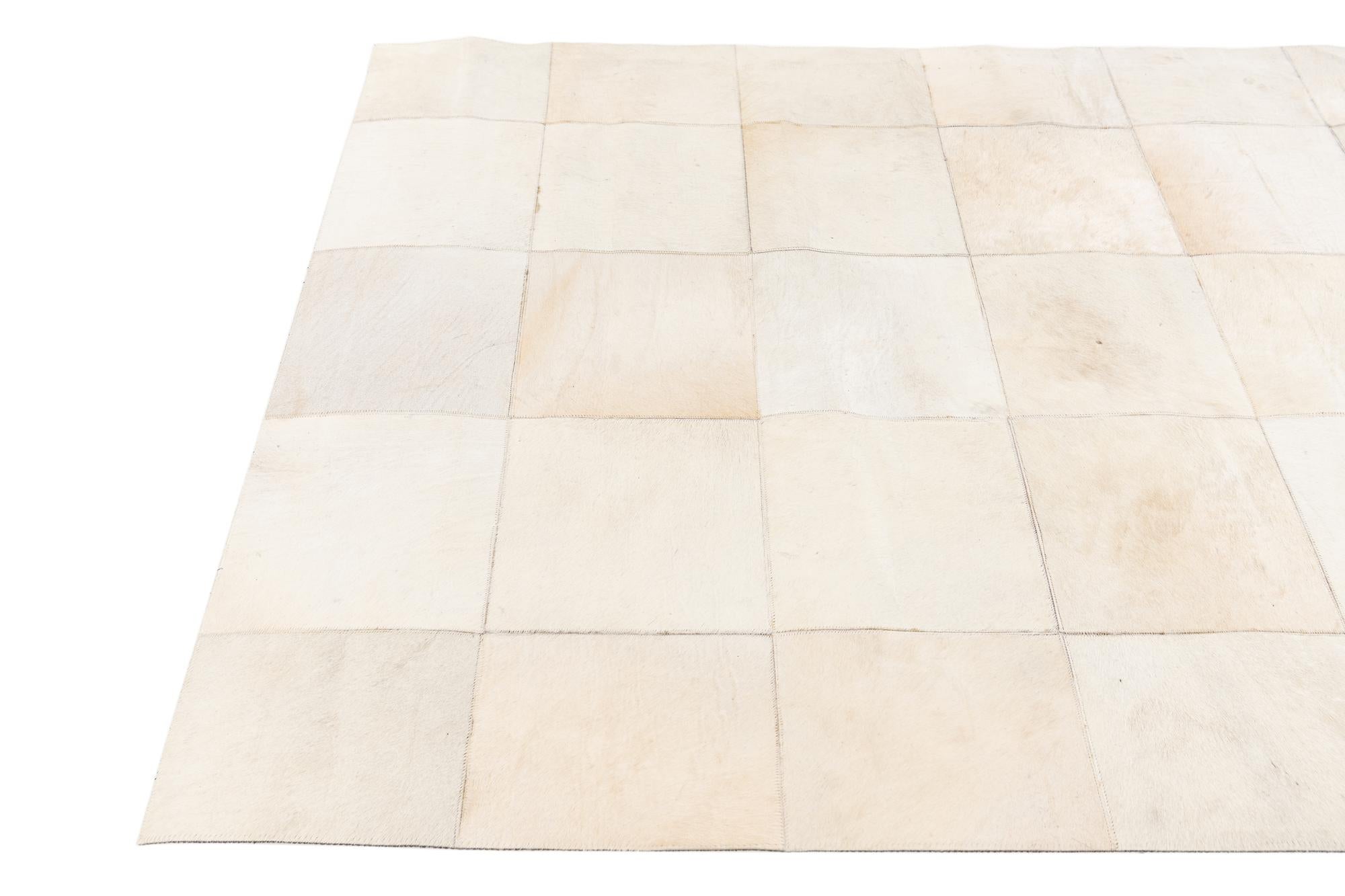 4' 3 x 6' 4 Cowhide Stocks Rug