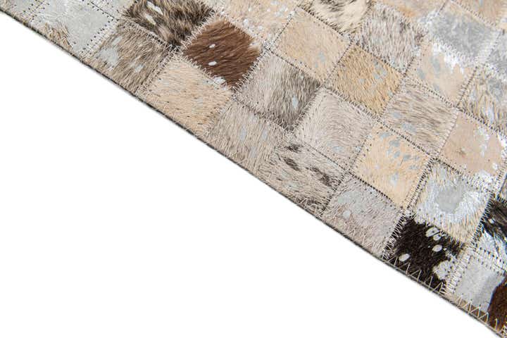4' x 5' 7 Cowhide Stocks Rug