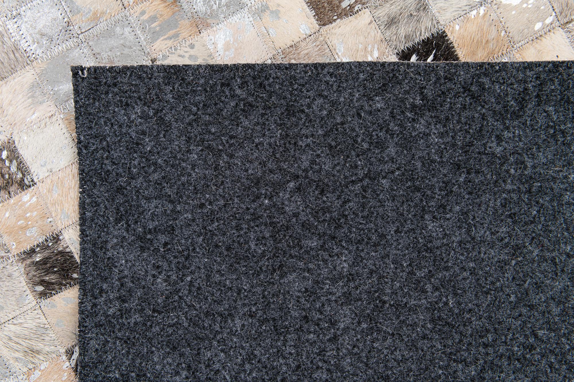 4' x 5' 7 Cowhide Stocks Rug