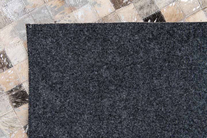 4' x 5' 7 Cowhide Stocks Rug
