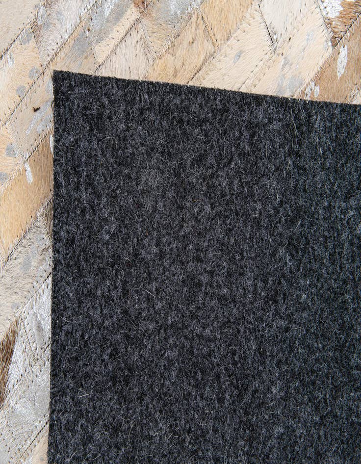 Detail image of 4' x 4' 8 Cowhide Stocks Rug