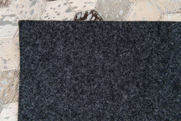 4' x 5' 7 Cowhide Stocks Rug