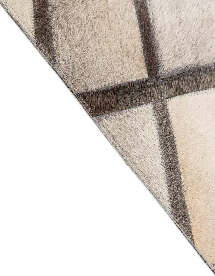 Detail image of 4' 1 x 6' 3 Cowhide Stocks Rug