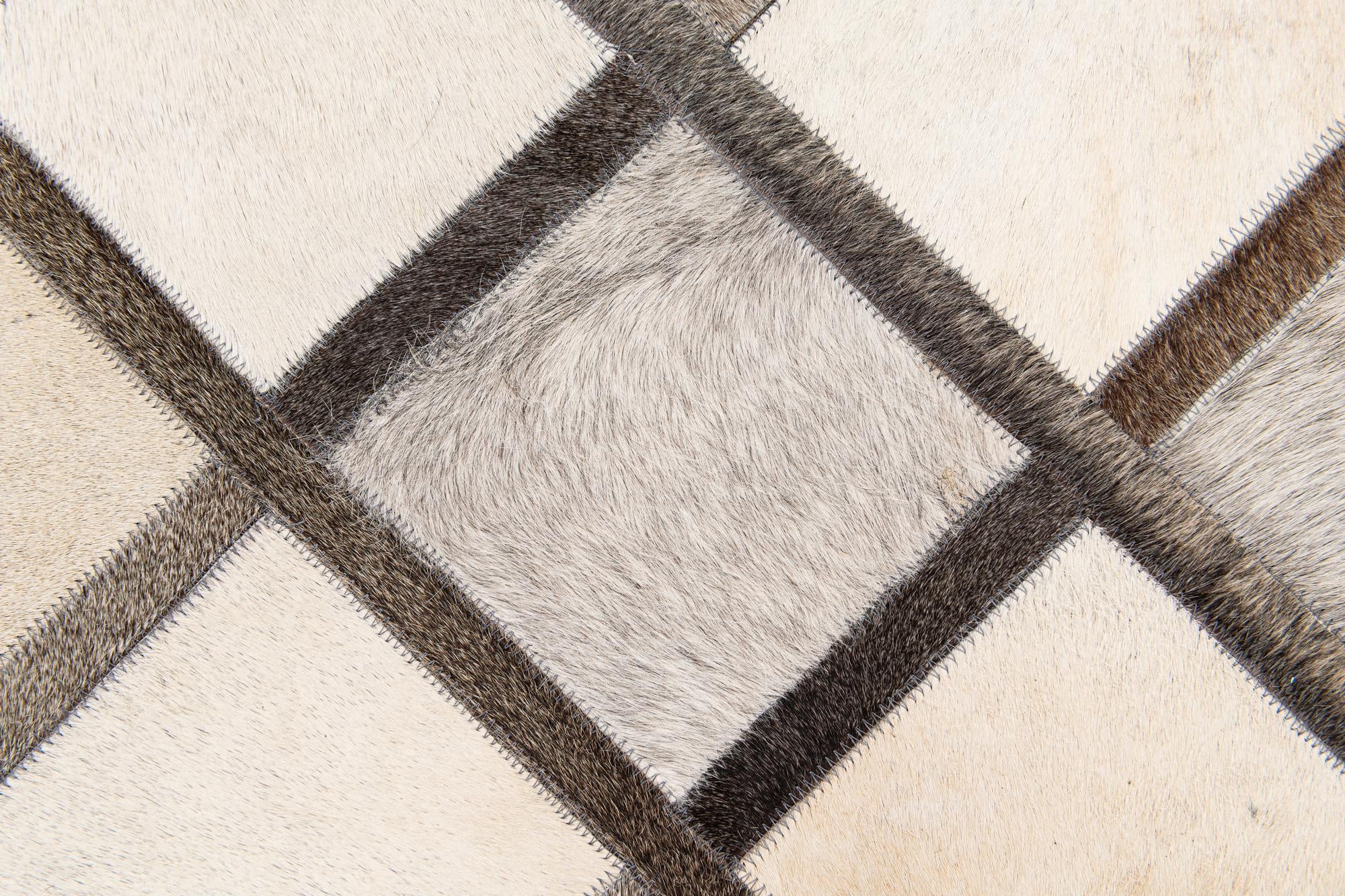 4' 1 x 6' 3 Cowhide Stocks Rug