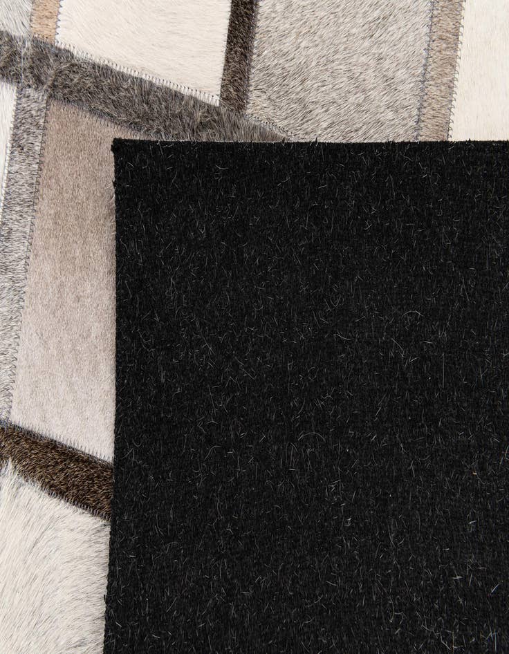 Detail image of 4' 1 x 6' 3 Cowhide Stocks Rug