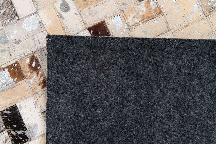 4' 1 x 5' 10 Cowhide Stocks Rug