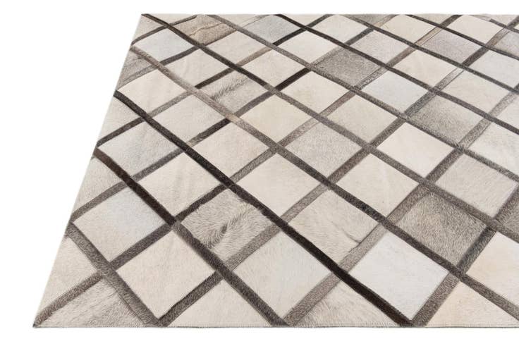 Detail image of 4' 1 x 6' 1 Cowhide Stocks Rug