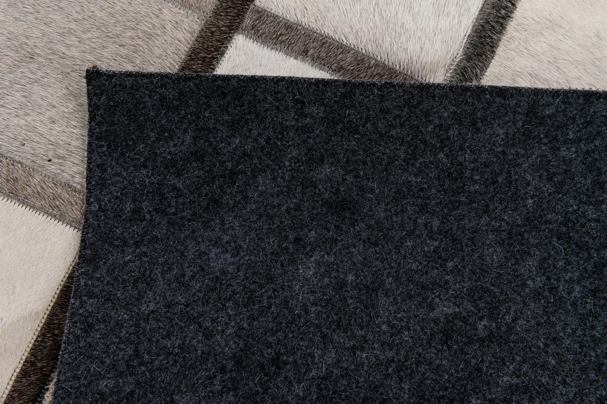 4' 1 x 6' 1 Cowhide Stocks Rug
