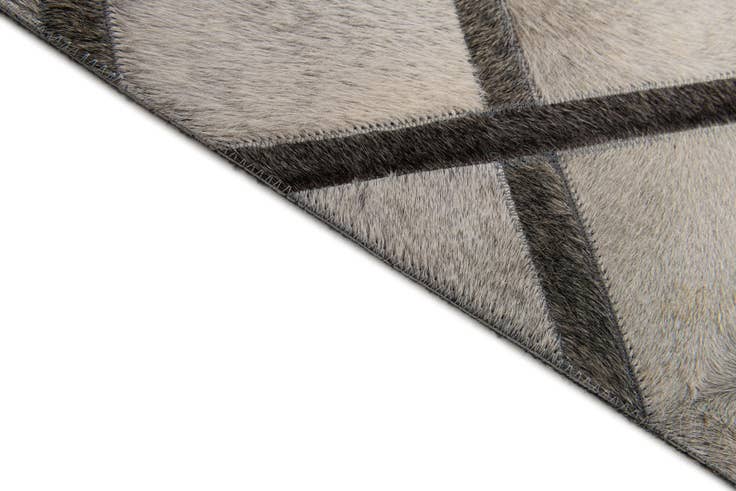 Detail image of 4' 1 x 6' 3 Cowhide Stocks Rug