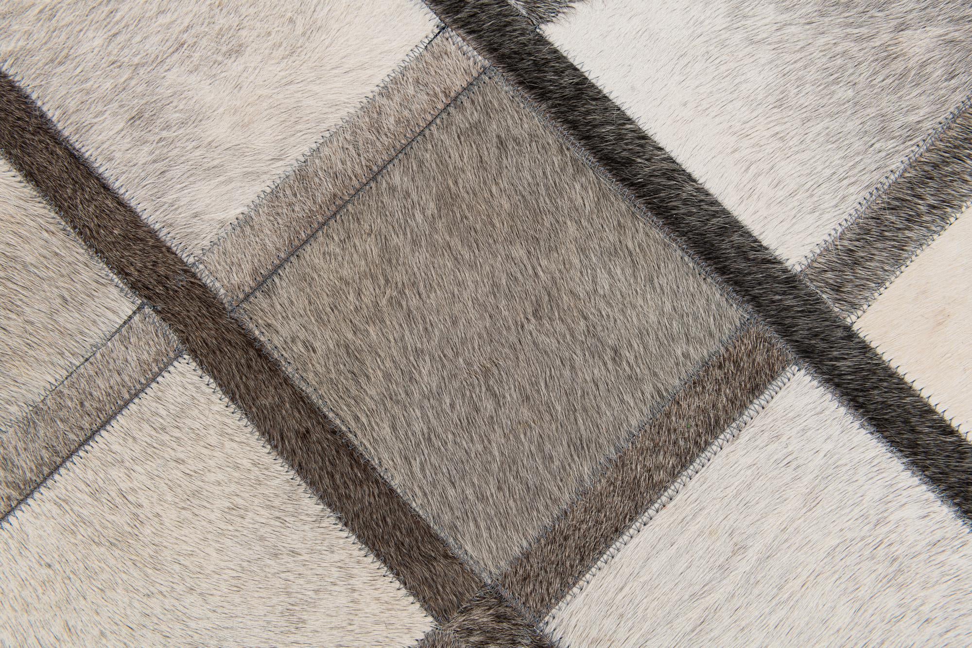 4' 1 x 6' 3 Cowhide Stocks Rug