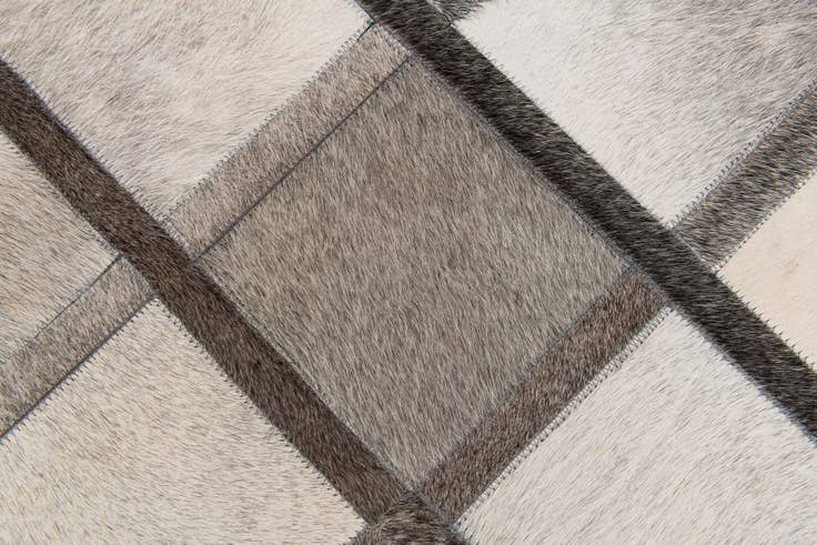 Detail image of 4' 1 x 6' 3 Cowhide Stocks Rug