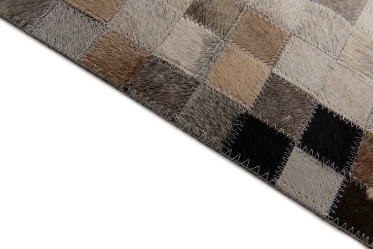 Detail image of 4' 1 x 5' 9 Cowhide Stocks Rug