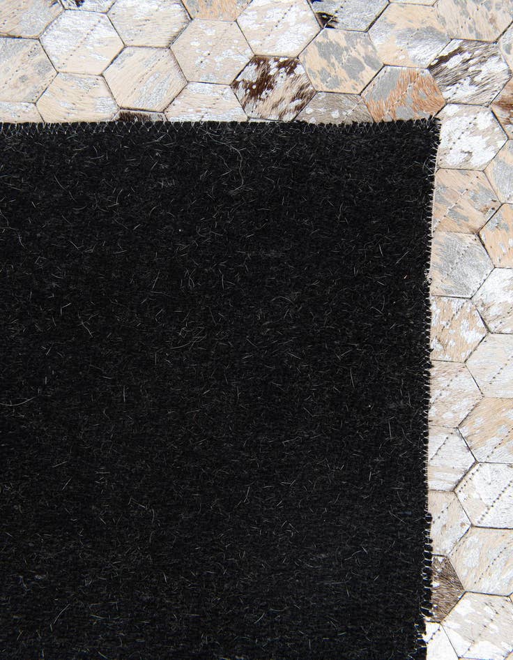 Detail image of 4' 1 x 5' 6 Cowhide Stocks Rug