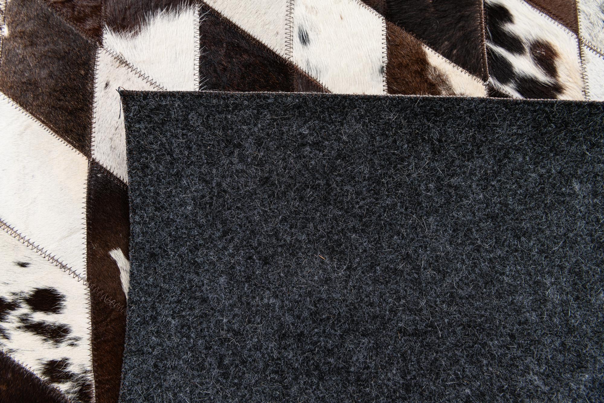 4' x 5' 11 Cowhide Stocks Rug