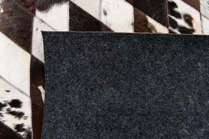 4' x 5' 11 Cowhide Stocks Rug