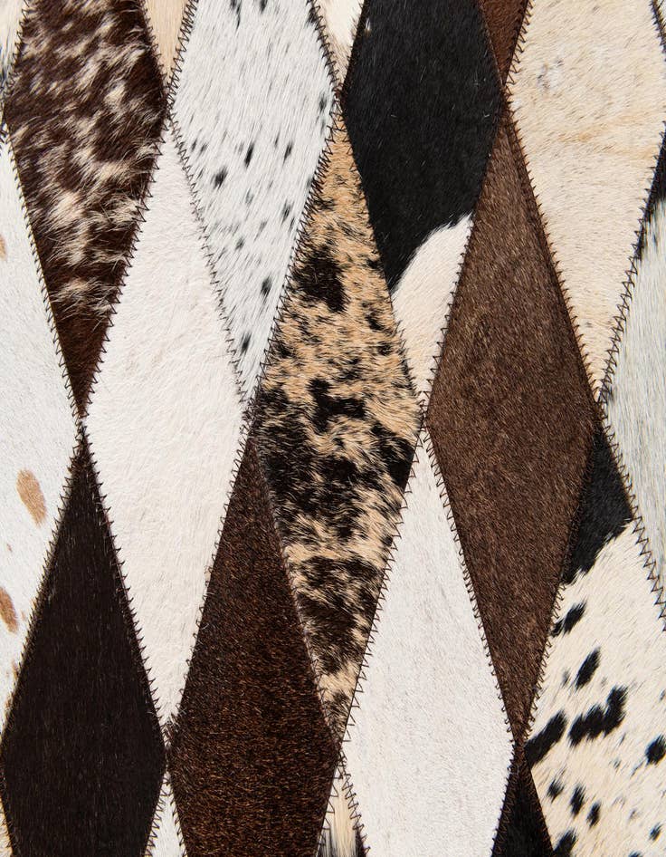 Detail image of 4' 1 x 5' 10 Cowhide Stocks Rug