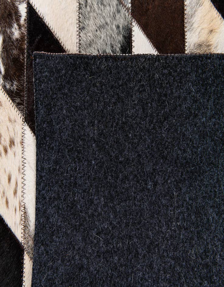 Detail image of 4' 1 x 5' 10 Cowhide Stocks Rug