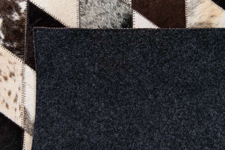 4' 1 x 5' 10 Cowhide Stocks Rug