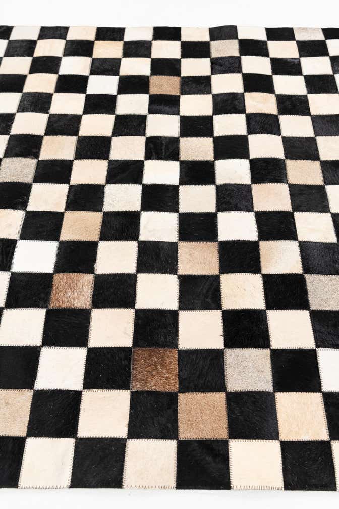 3' 11 x 5' 10 Cowhide Stocks Rug