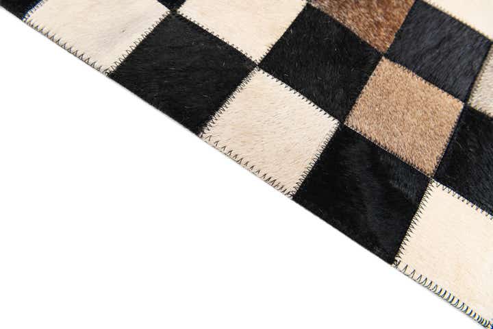 3' 11 x 5' 10 Cowhide Stocks Rug