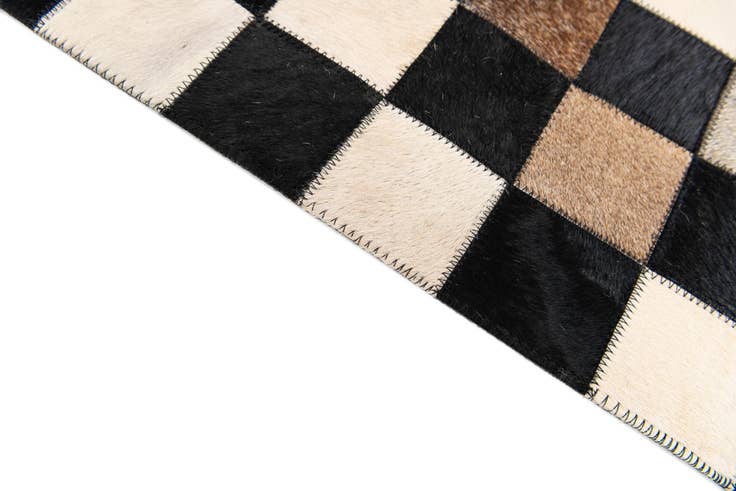 Detail image of 3' 11 x 5' 10 Cowhide Stocks Rug