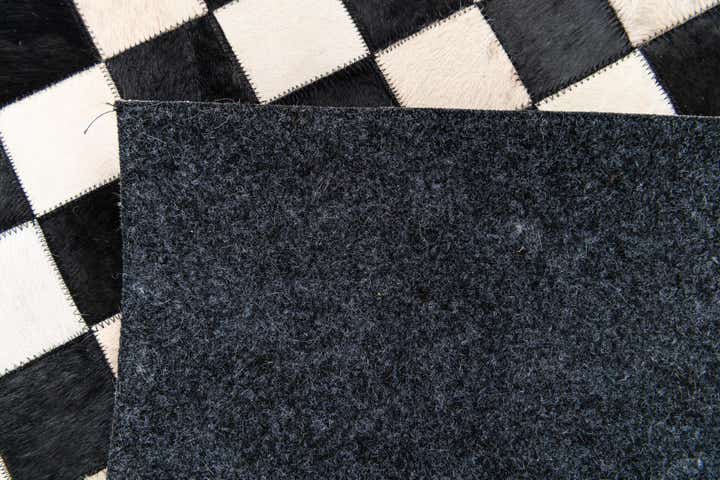 3' 11 x 5' 10 Cowhide Stocks Rug
