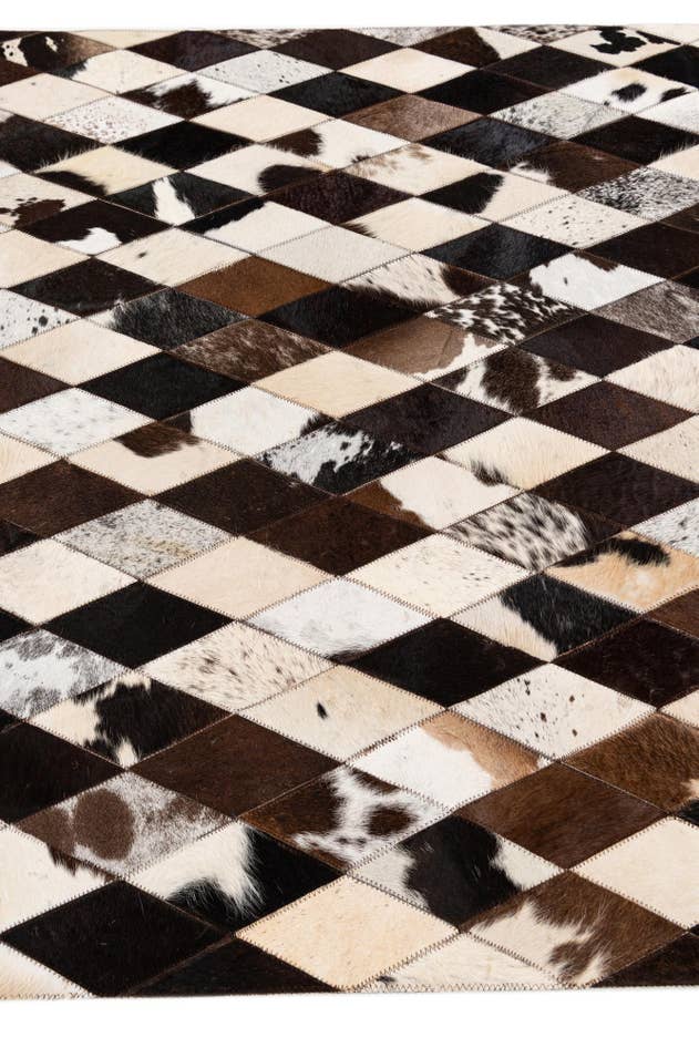 Detail image of 4' 1 x 5' 11 Cowhide Stocks Rug