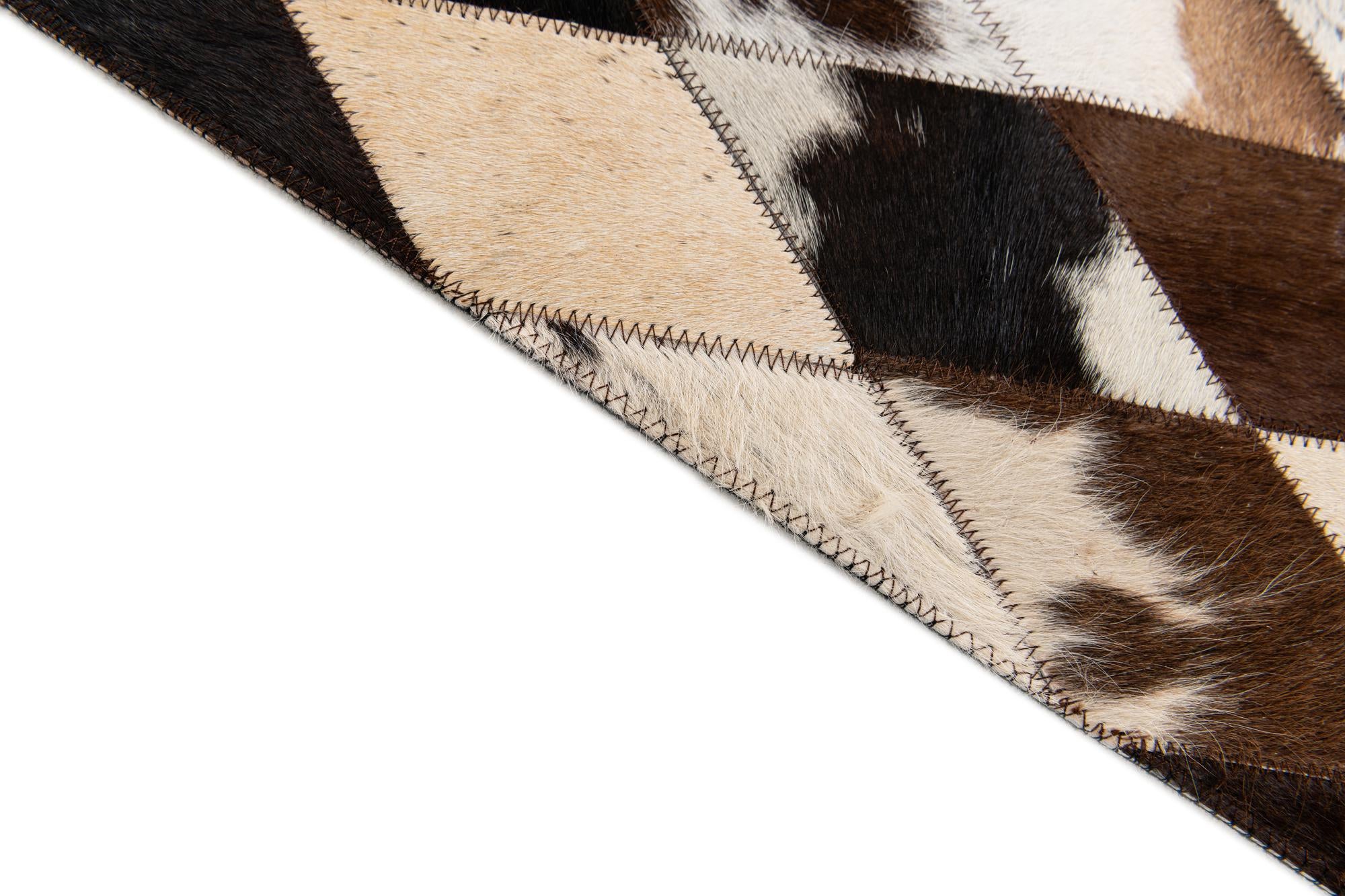4' 1 x 5' 11 Cowhide Stocks Rug