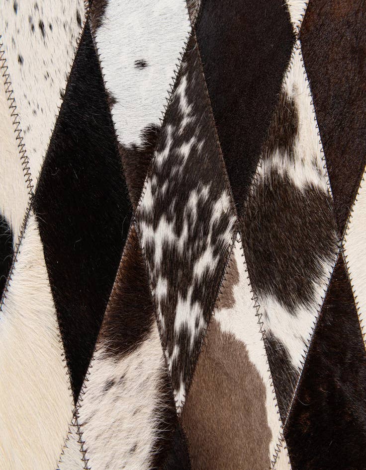 Detail image of 4' 1 x 5' 11 Cowhide Stocks Rug