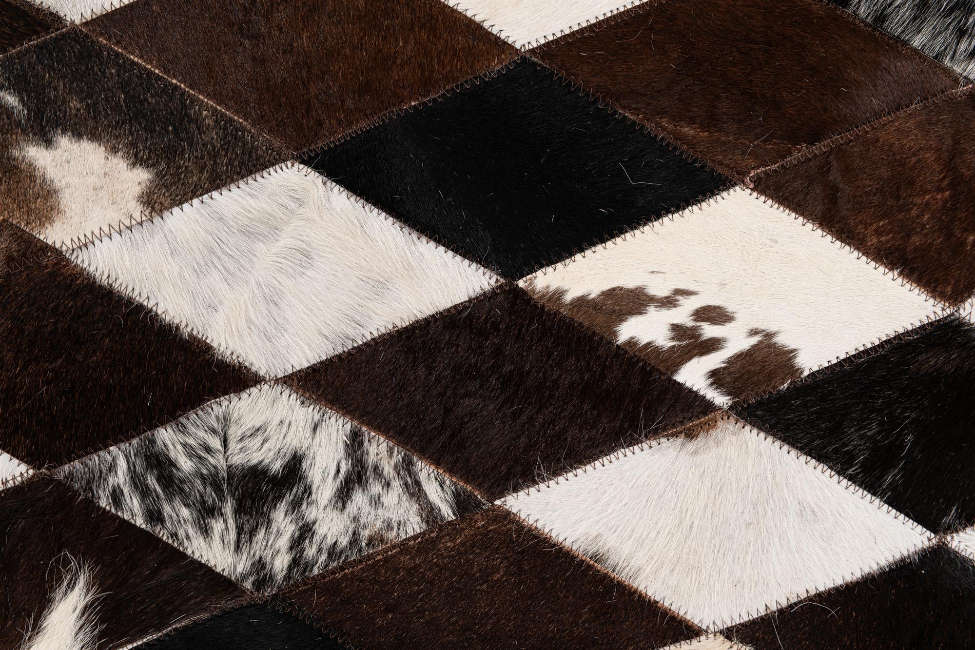4' x 5' 11 Cowhide Stocks Rug